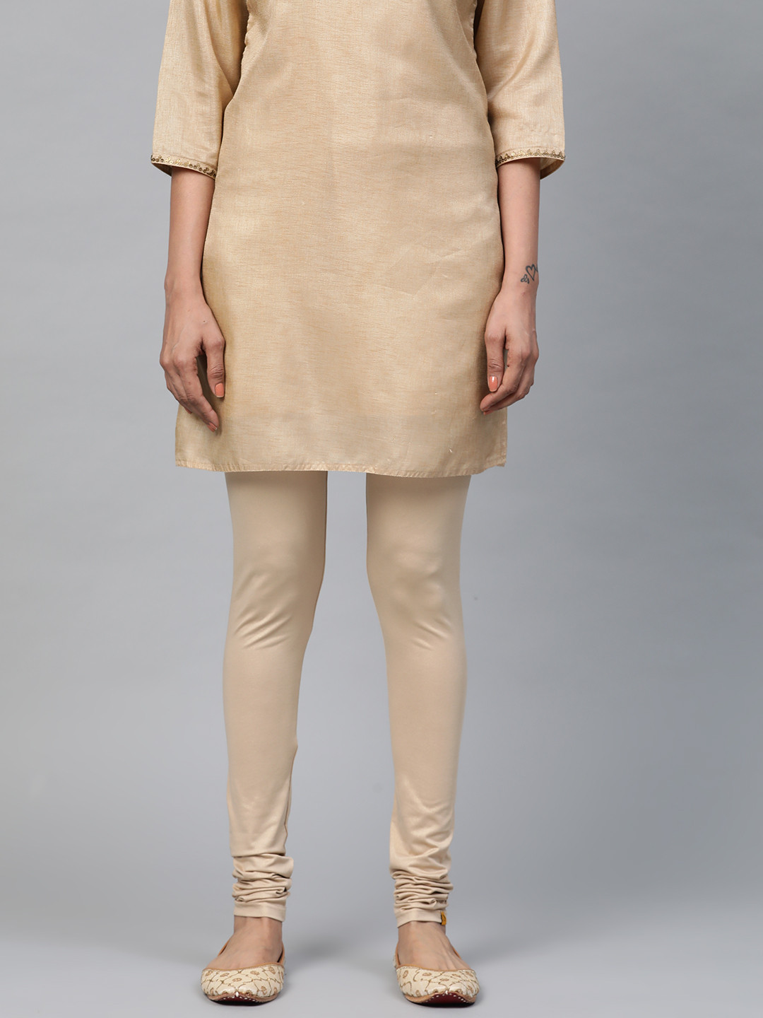AURELIA Women Beige Shimmery Solid Churidar Leggings