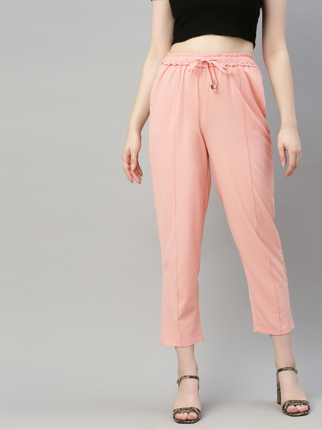 Sera Women Pink Tapered Fit Solid Peg Trousers
