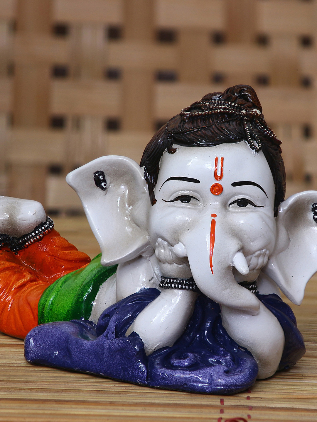 eCraftIndia Resting Position Lord Ganesha Blue Polyresin Glossy Prayer Room Small Showpiece - 4.5 Inches