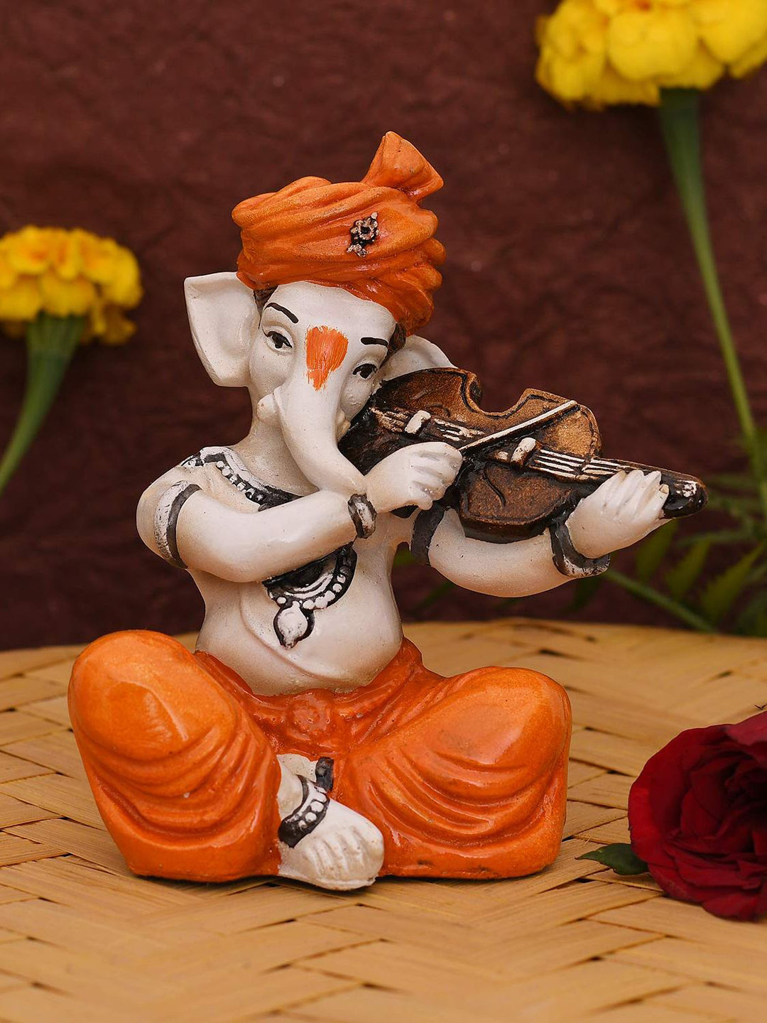 CraftVatika Orange & White Handcrafted Lord Ganesha Playing Violin Idol Showpiece