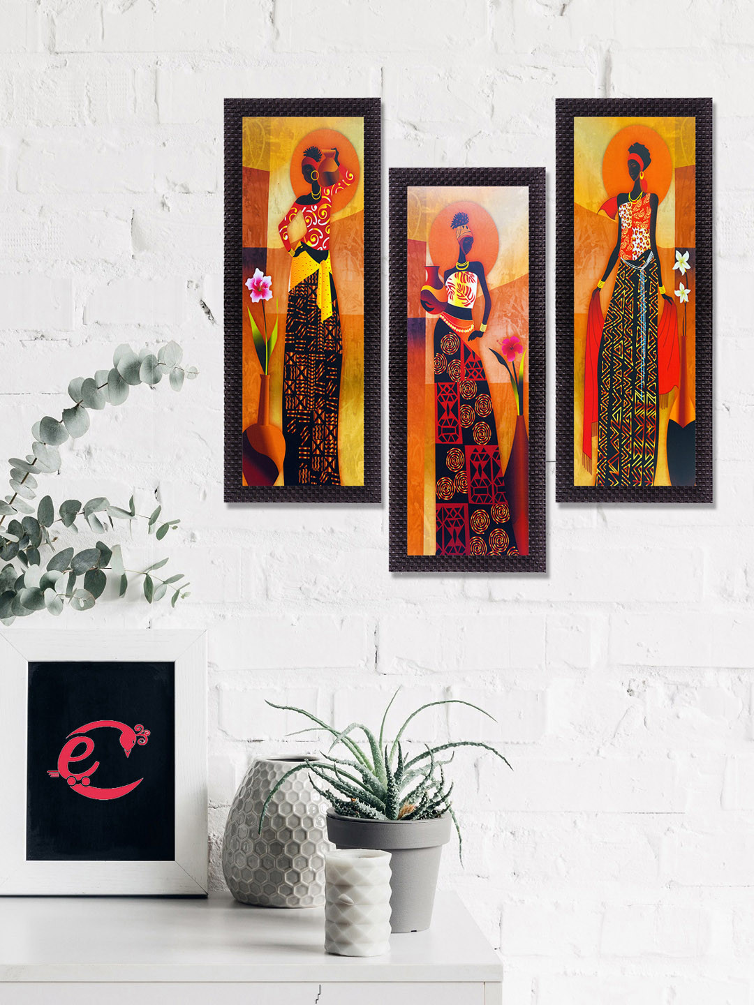 eCraftIndia Set Of 3 Orange & Black Tribal Village Ladies Printed Satin Matt Texture UV Wall Art