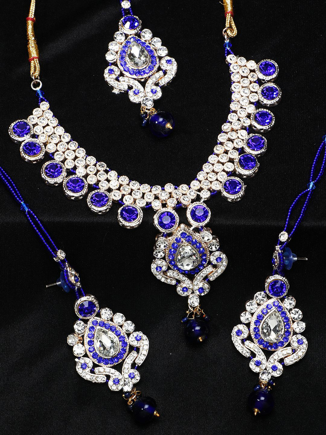 ANIKAS CREATION Gold-Plated Blue & White Stone-Studded Beaded Jadau Jewellery Set