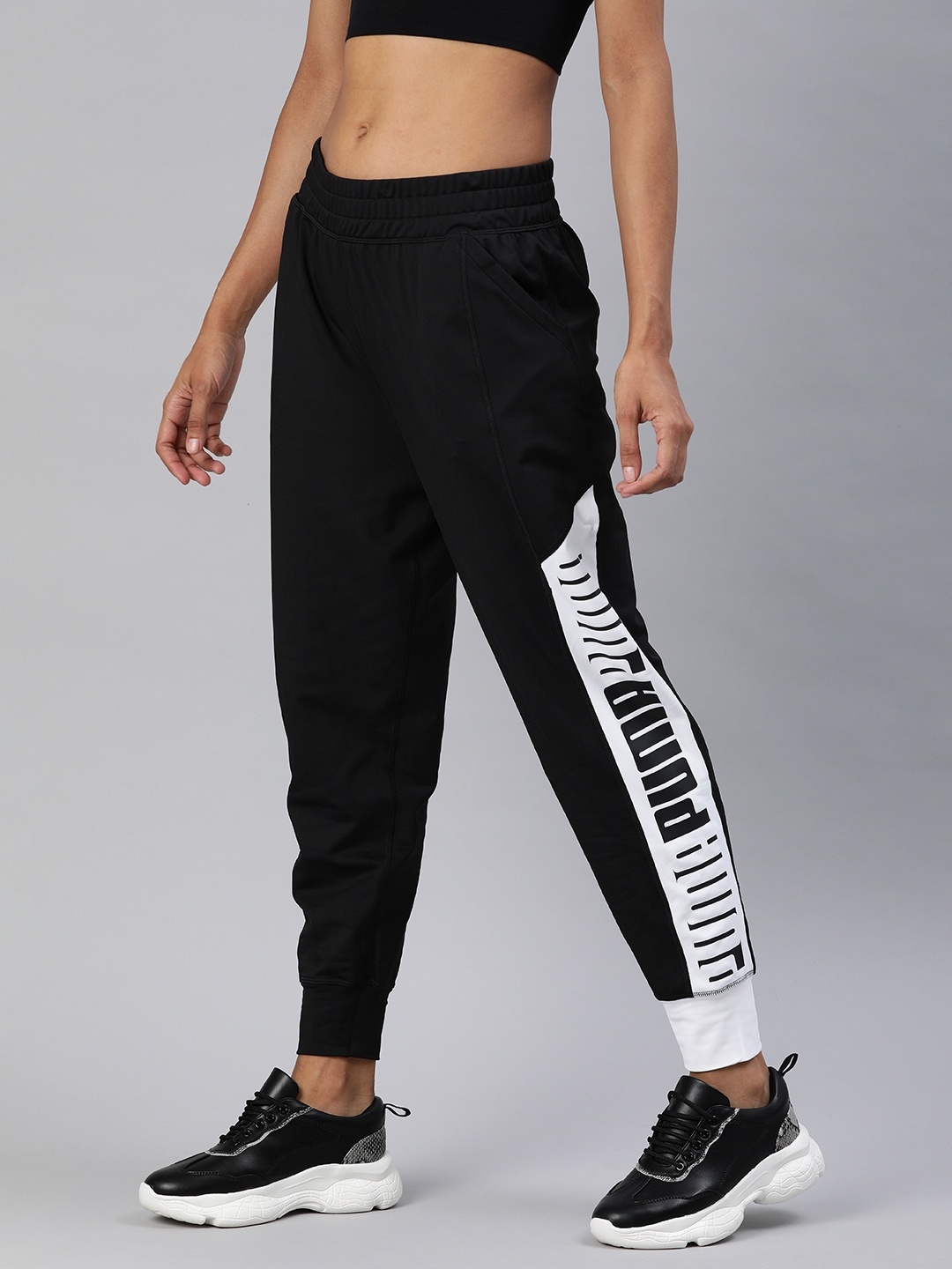 Buy Puma Women Black & White Brand Logo Printed Stretch DryCELL Running & Training Joggers - Track Pants Women |