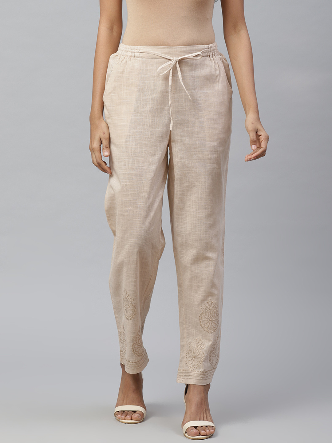 akheri Women Beige Tapered Fit Embroidered Detail Regular Trousers
