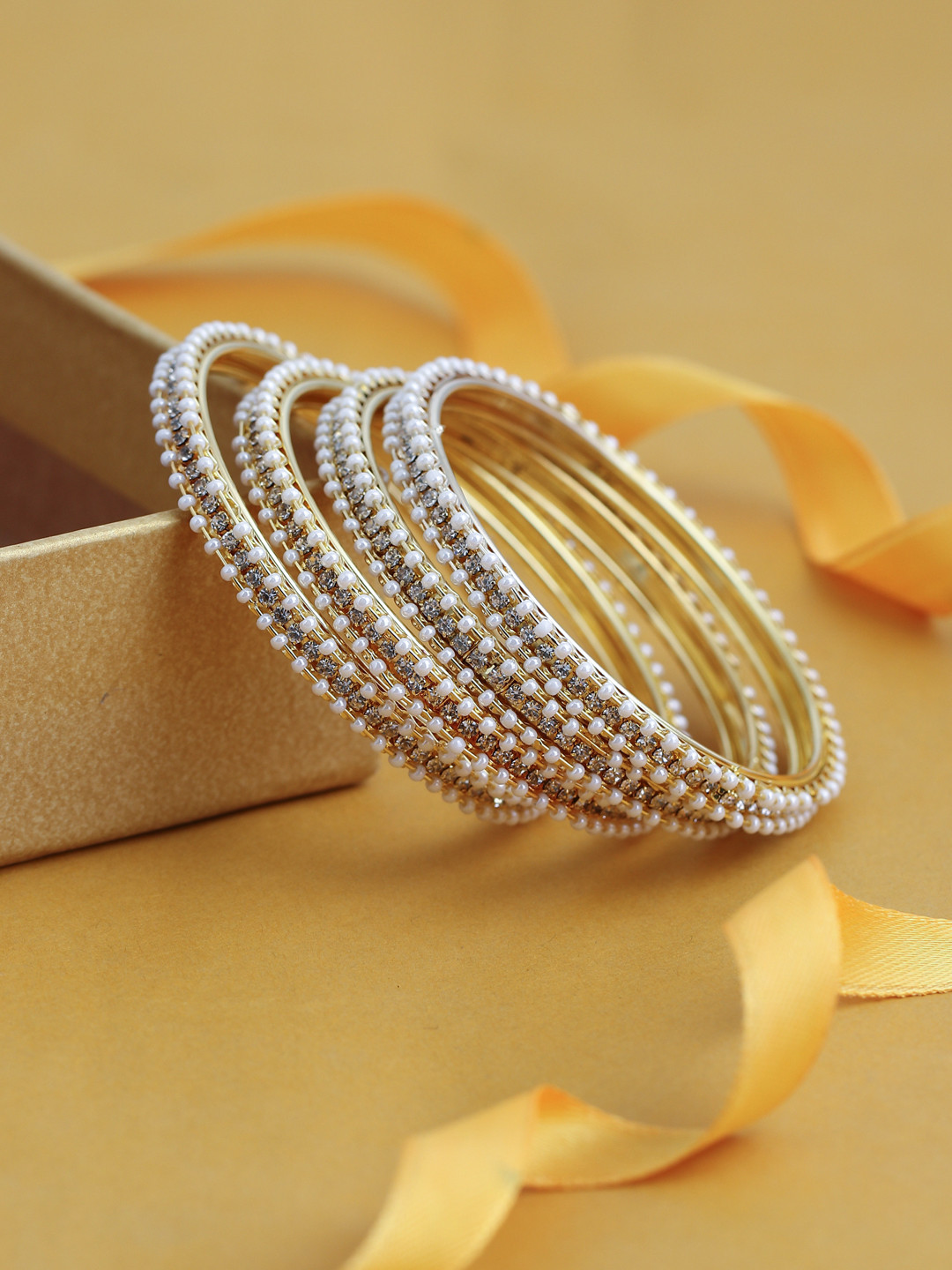 Sukkhi Set Of 4 Gold-Plated White Austrian Diamond-Studded Pearl Bangles