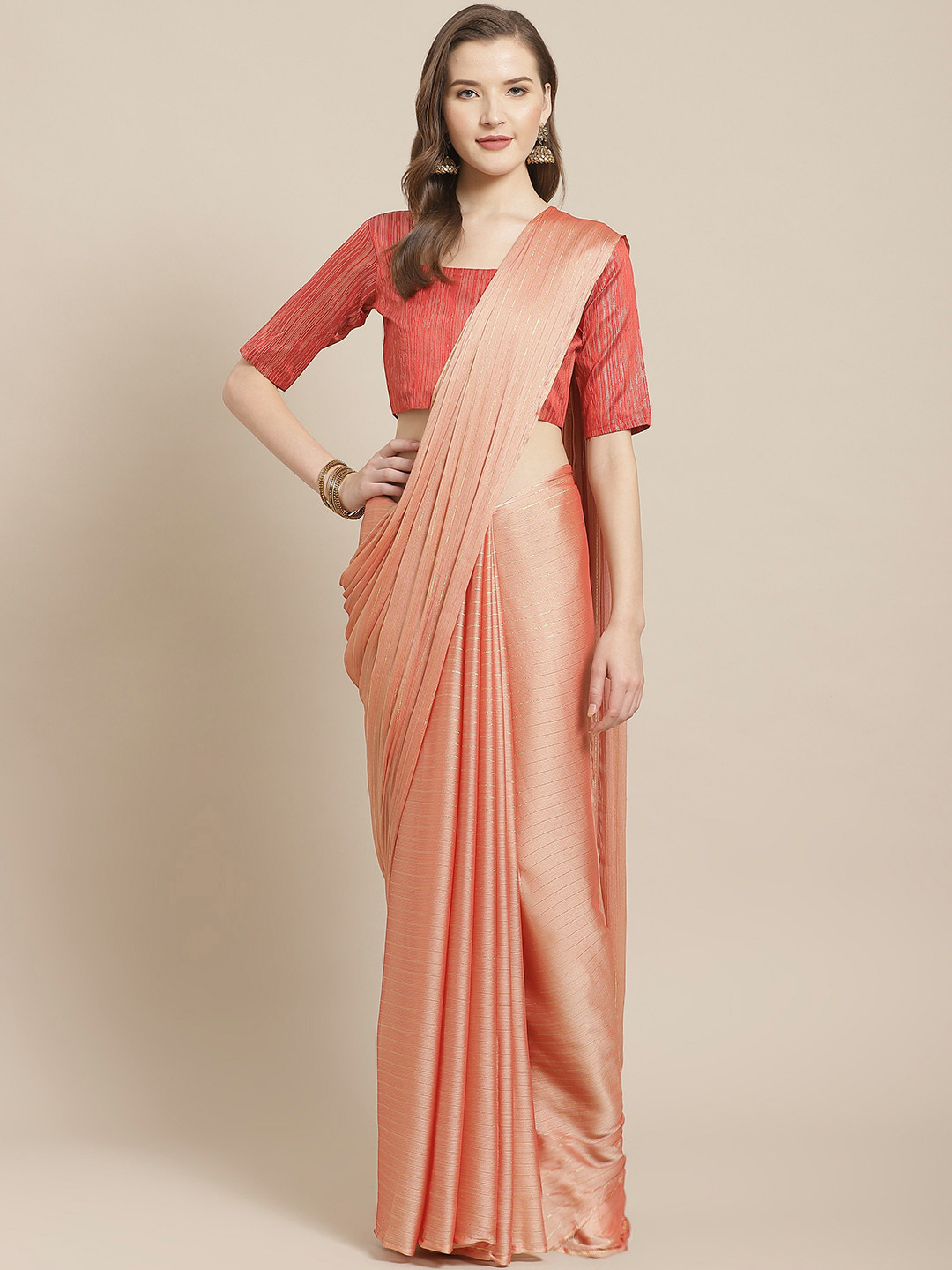 Saree mall Peach-Coloured Striped Saree with Tassels