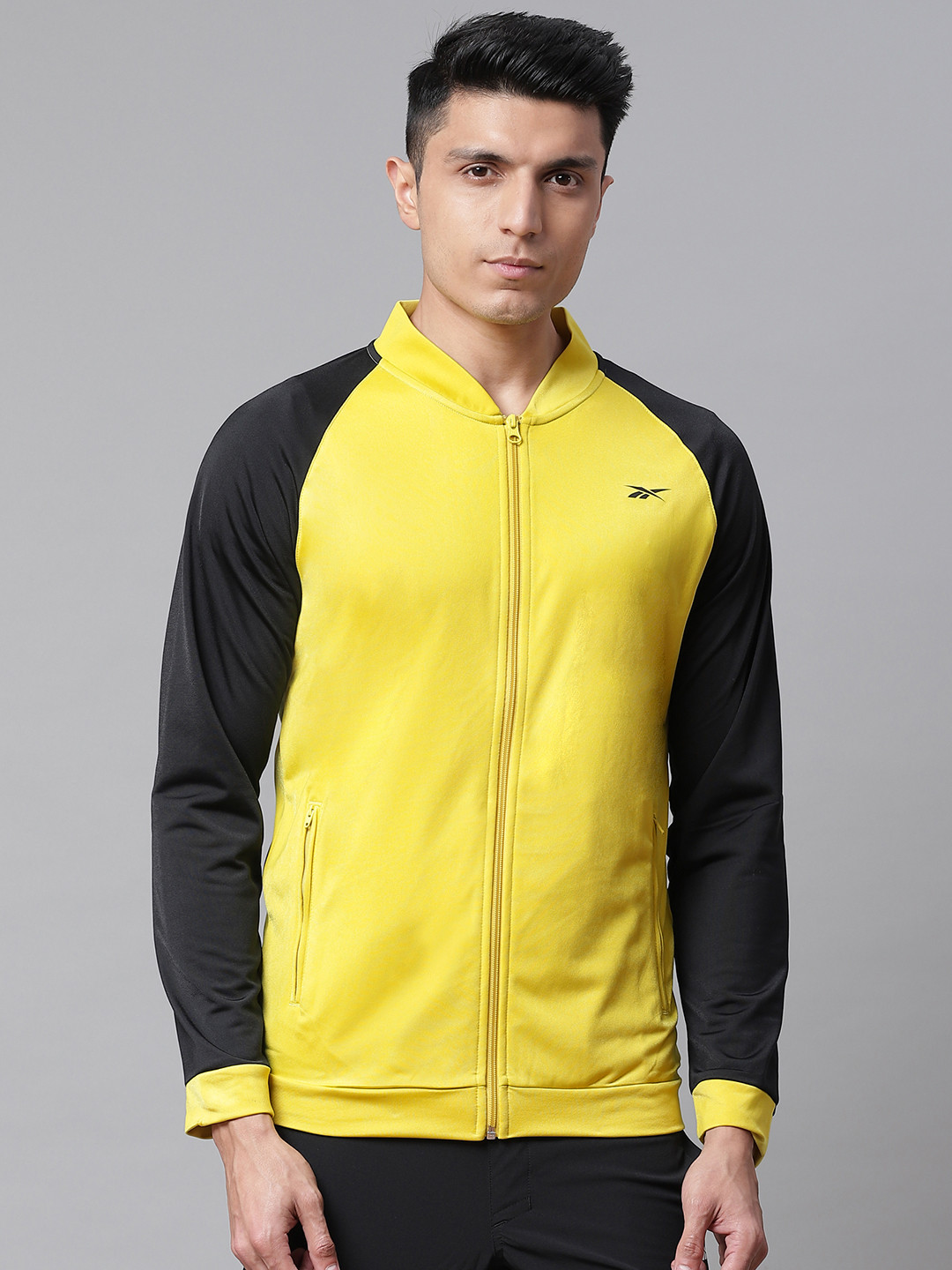 Reebok Men Yellow Solid Training Hustle Track Jacket
