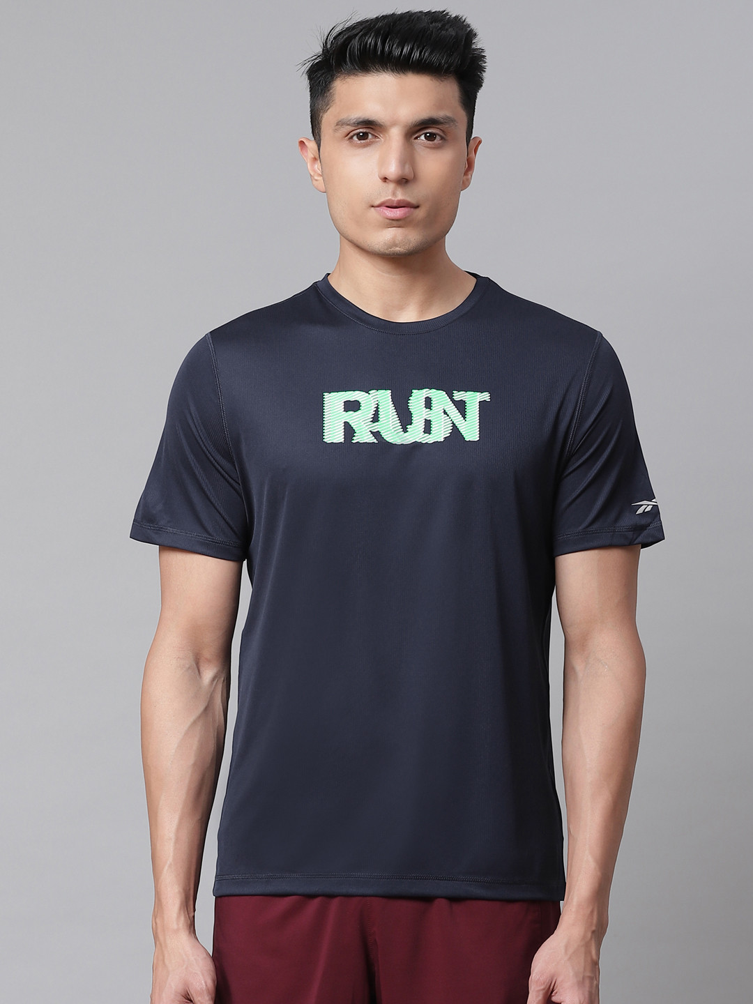 Reebok Men Navy Blue & Green Solid Run Essentials Graphic T-shirt