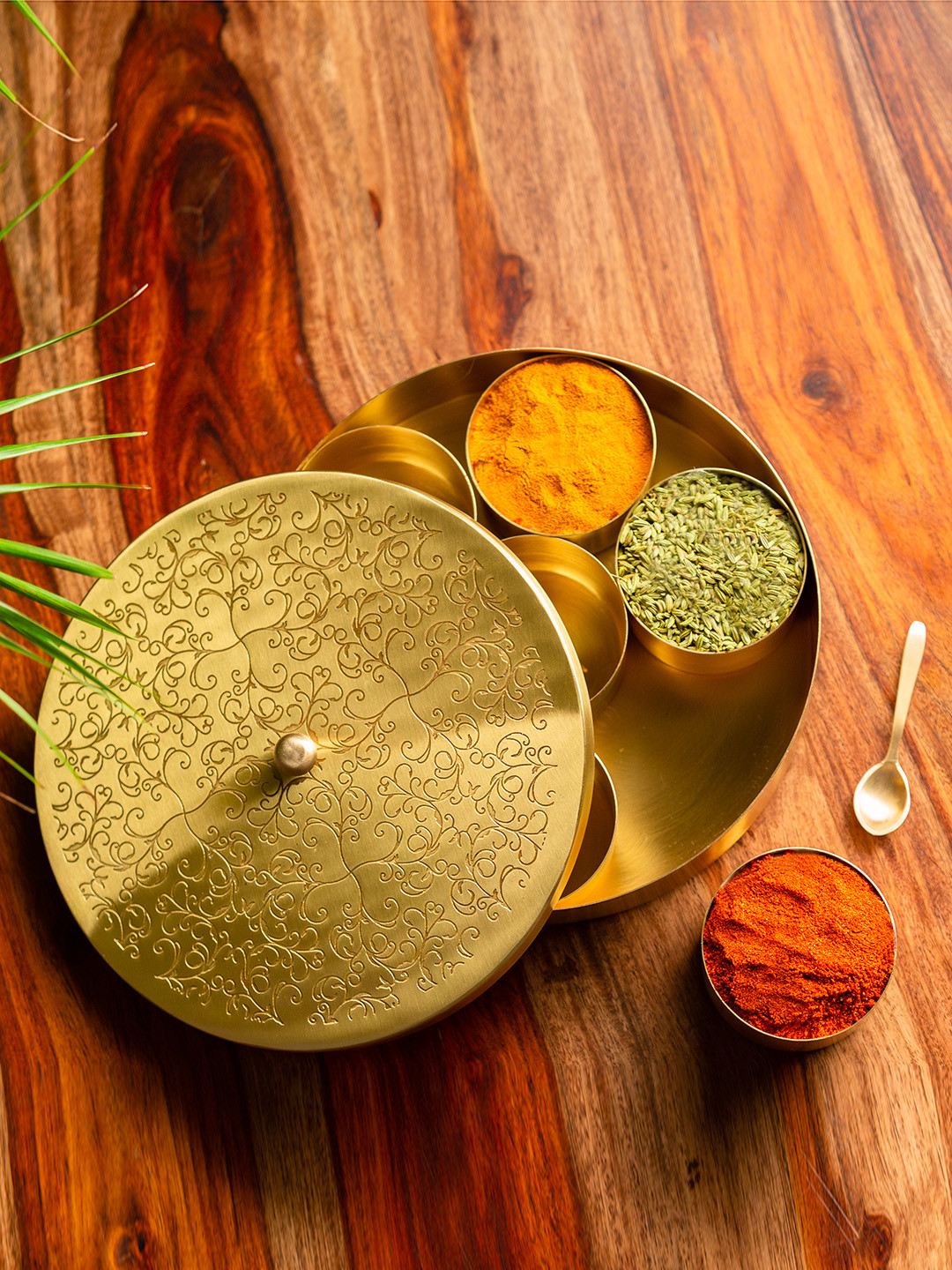 ExclusiveLane Gold-Toned Floral-Etched Handcrafted Brass Spice Box With Spoon
