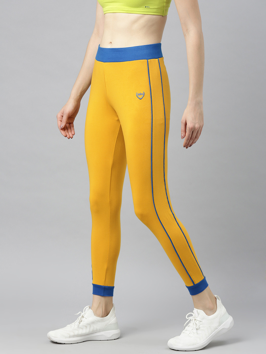 Zebu Women Yellow Solid Skinny-Fit Cropped Joggers with Side Stripe Detail