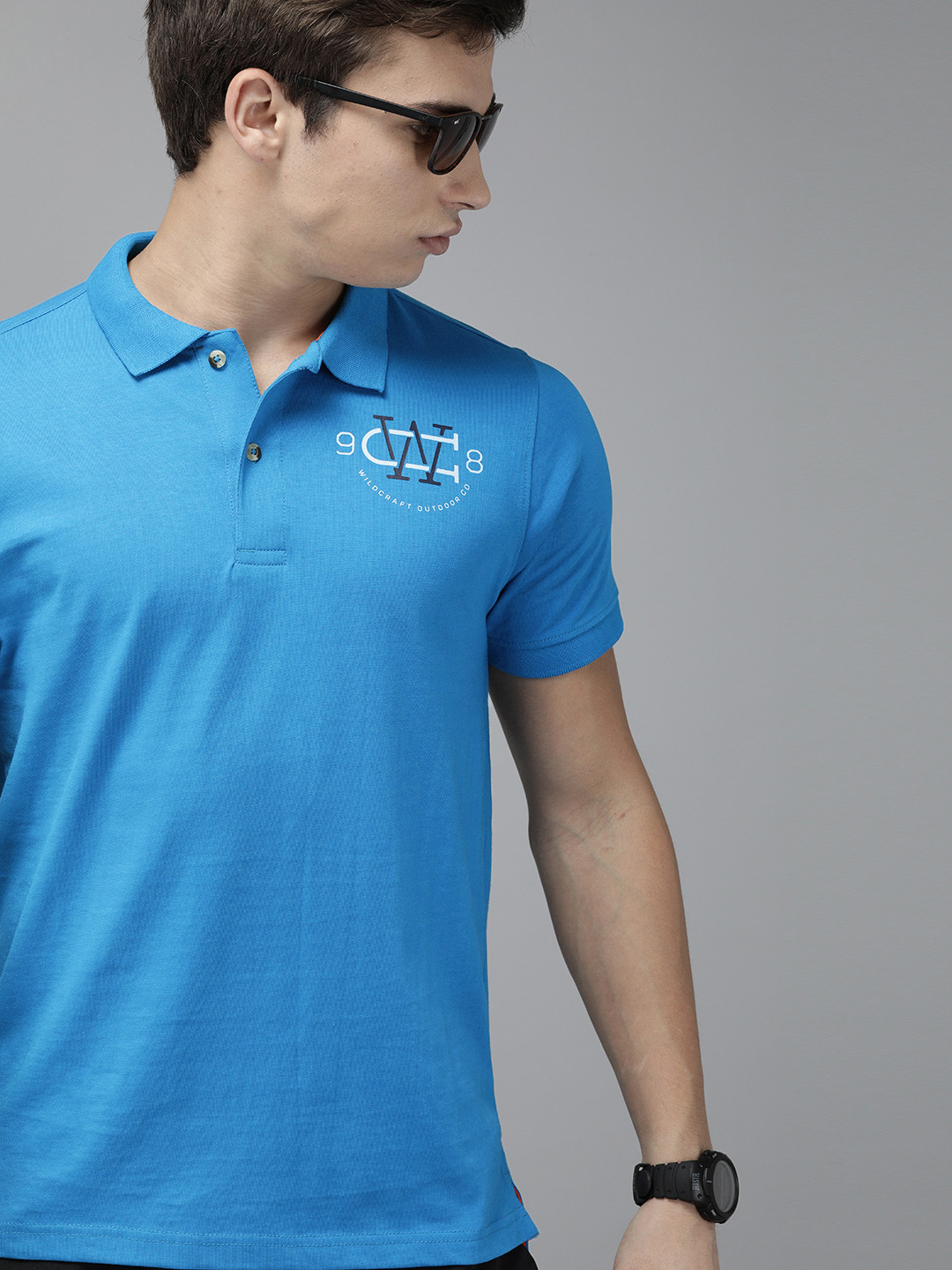 Wildcraft Men Blue Solid Polo Collar Pure Cotton T-shirt With Printed Detailing