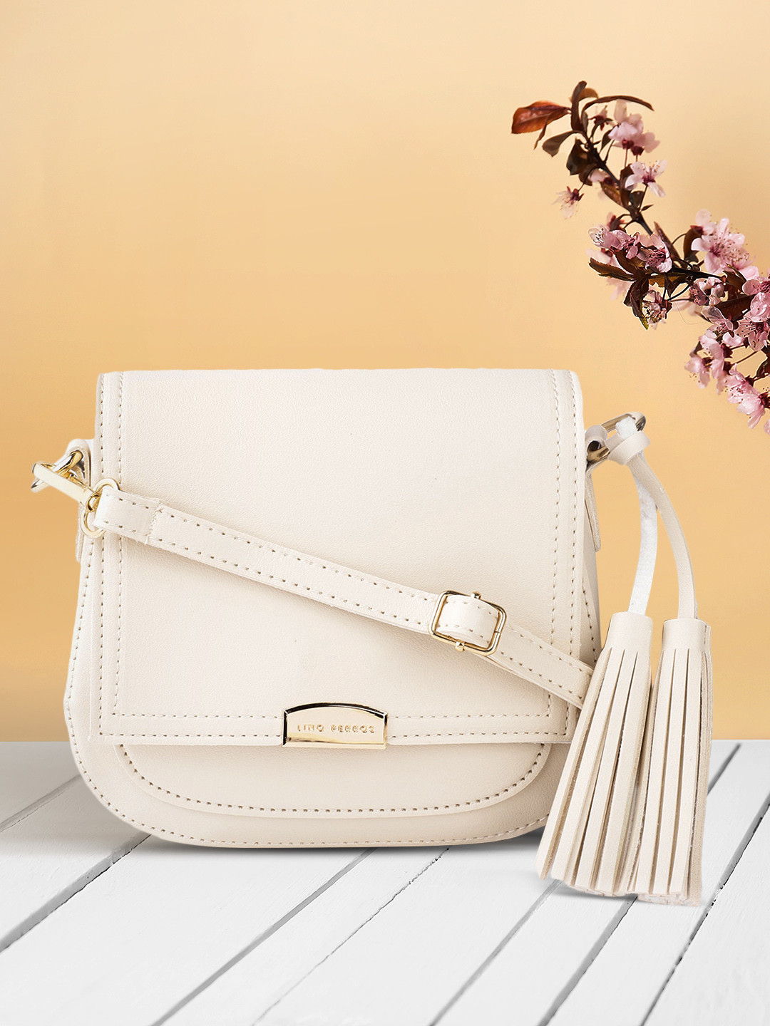 Lino Perros Women Cream-Coloured Solid Sling Bag with Tasselled Detail