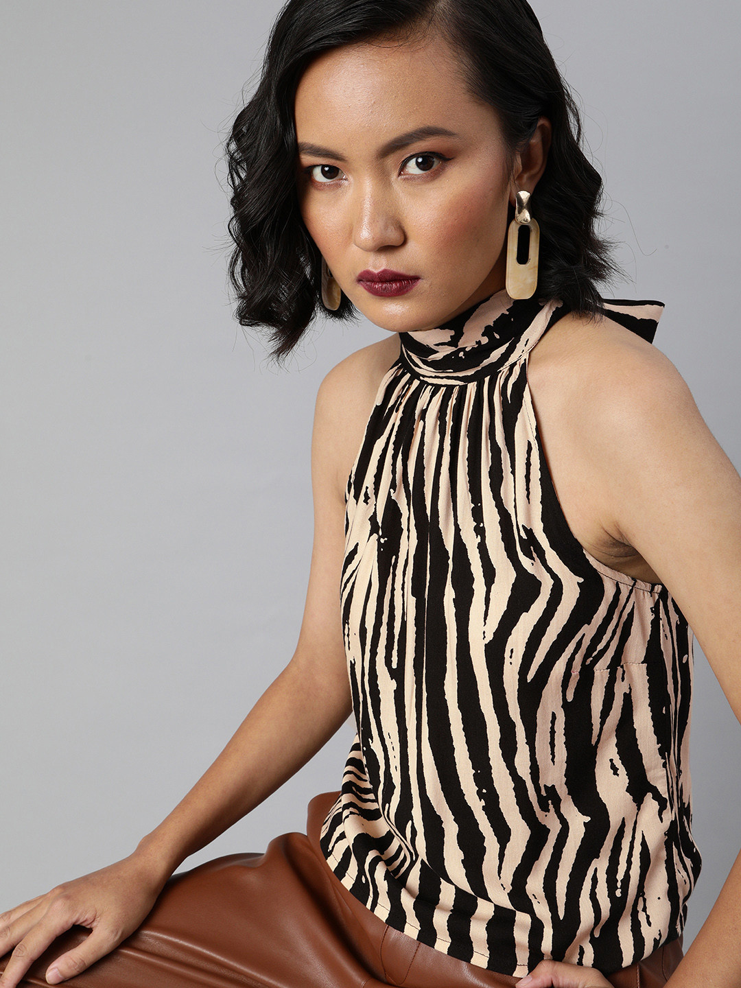 Sera Women Beige & Black Animal Printed Halter Neck Regular Top