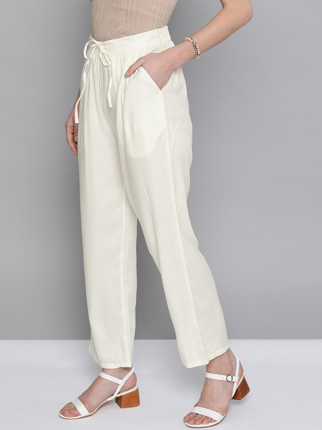 HERE&NOW Women Cream Coloured Solid Straight Palazzos