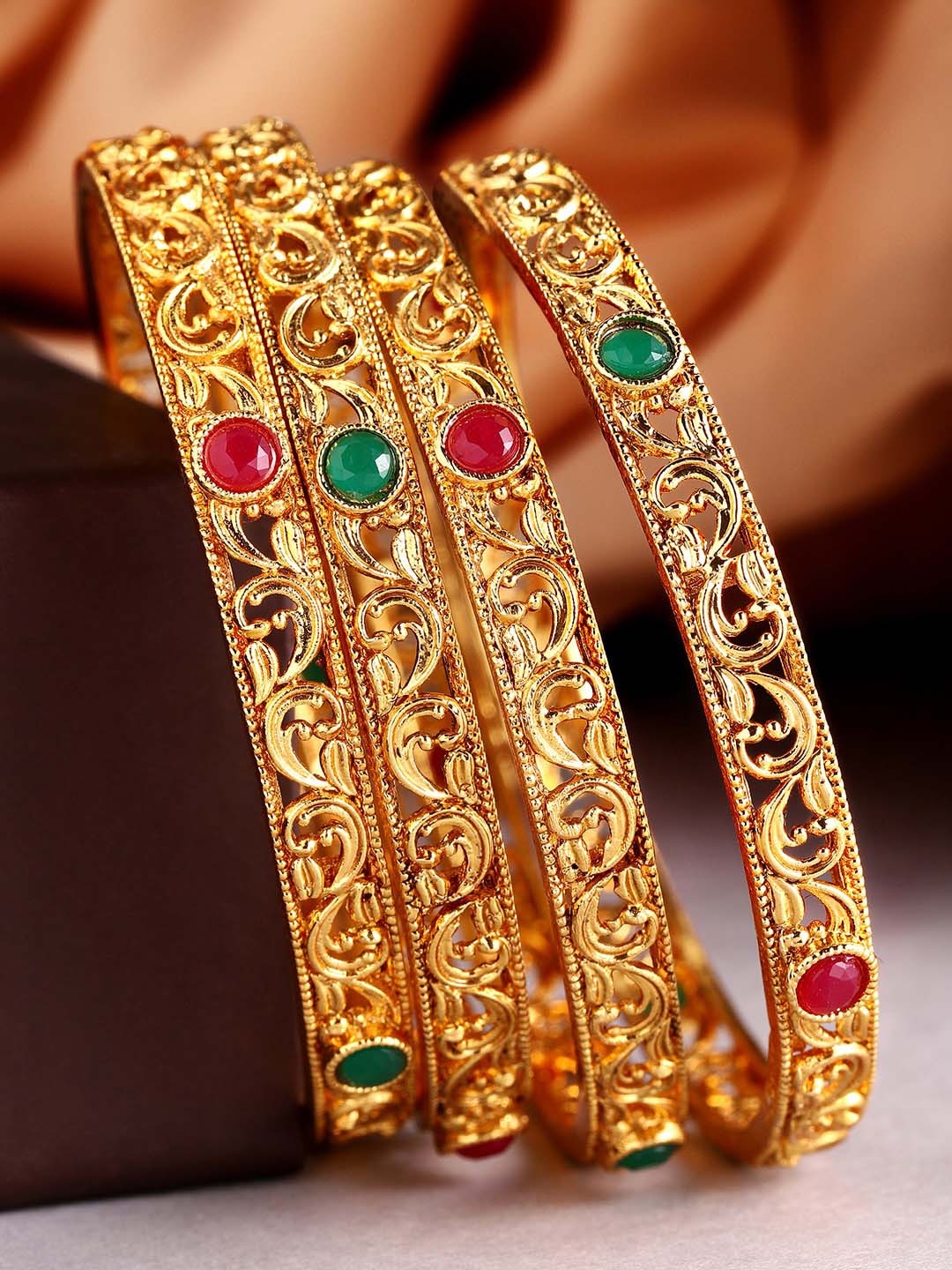 Rubans Set Of 4 24K Gold-Plated Red & Green Ruby & Stone-Studded Filigree Handcrafted Bangles Rubans Set Of 4 24K Gold-Plated Red & Green Ruby & Stone-Studded Filigree Handcrafted Bangles