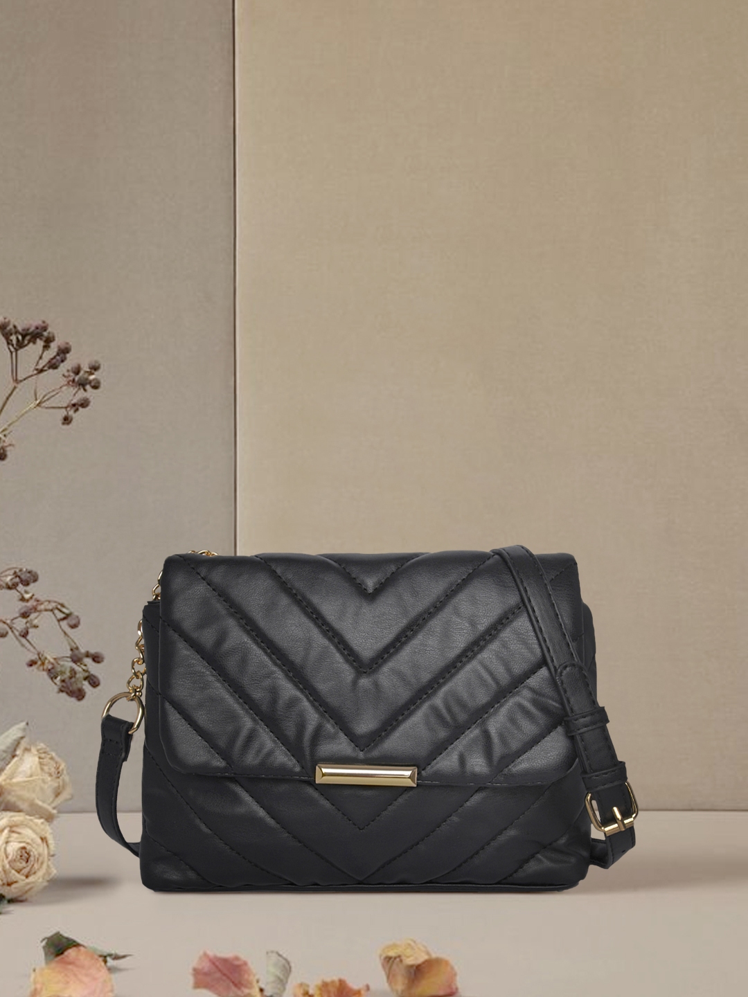 Black quilted sling bag shop