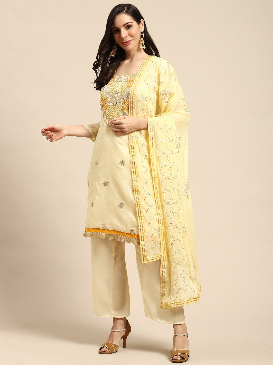 Rajnandini Yellow & Golden Embroidered Semi-Stitched Dress Material