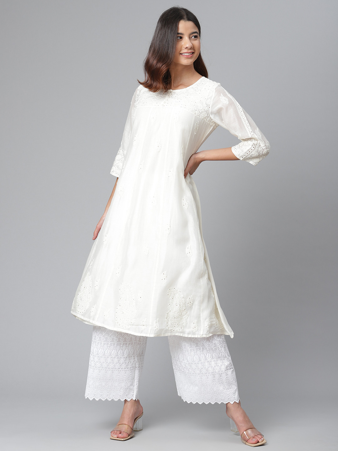 akheri Women Off White Ethnic Motifs Chikankari Mukaish A-line Kurta comes with Inner
