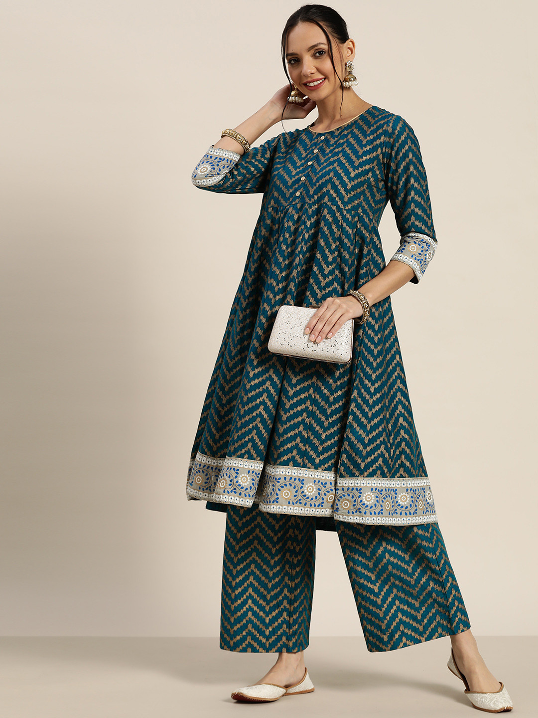 Sangria Women Teal Blue & Golden Geometric Panelled  Cotton Kurta with Palazzos