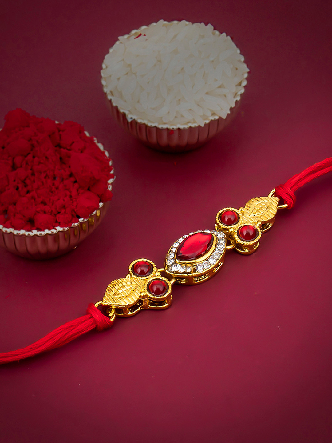 Sukkhi Rakhi Men Red Gold-Plated Rakhi With Roli Chawal And Raksha Bandhan Greeting Card