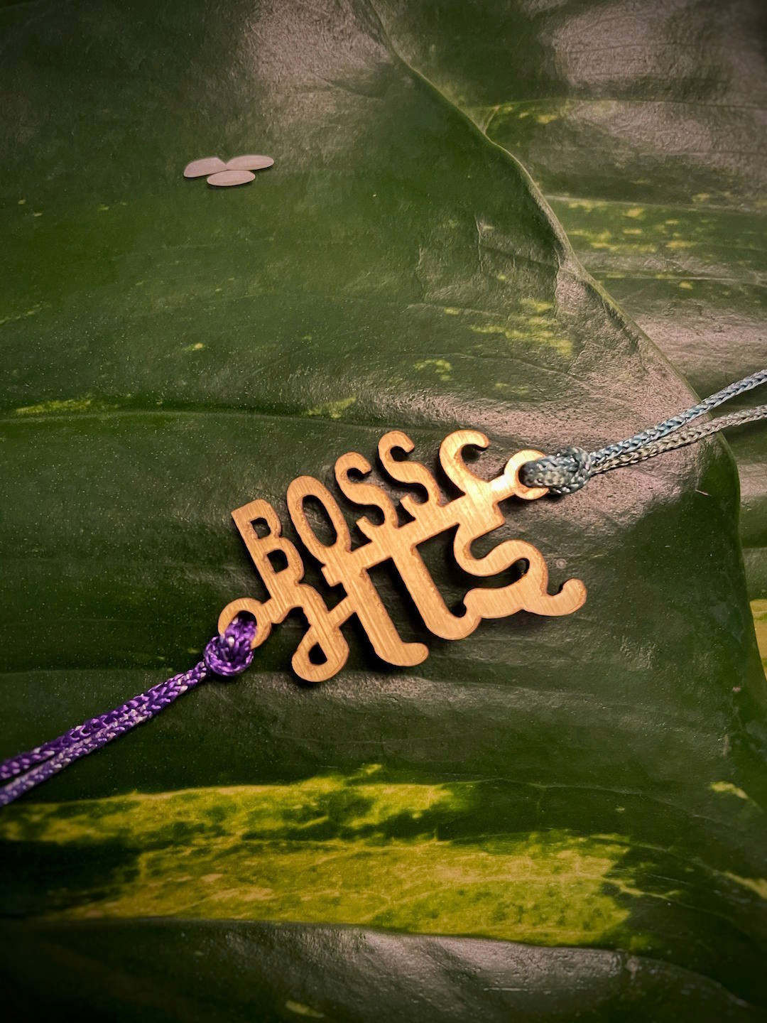 Digital Dress Room Gold-Toned Funky Slogan Boss Bhai Pendant Mauli Rakhi