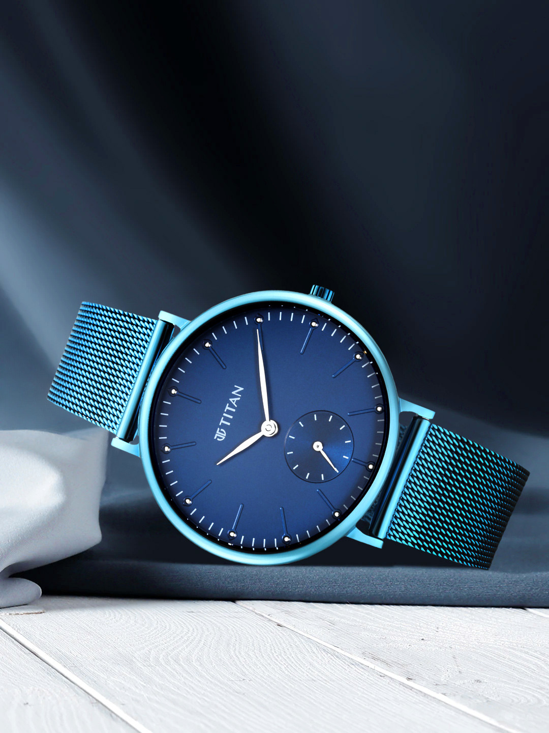 Titan Women Blue Brass Dial & Blue Bracelet Style Straps Analogue Watch [95142QM01-Blue]