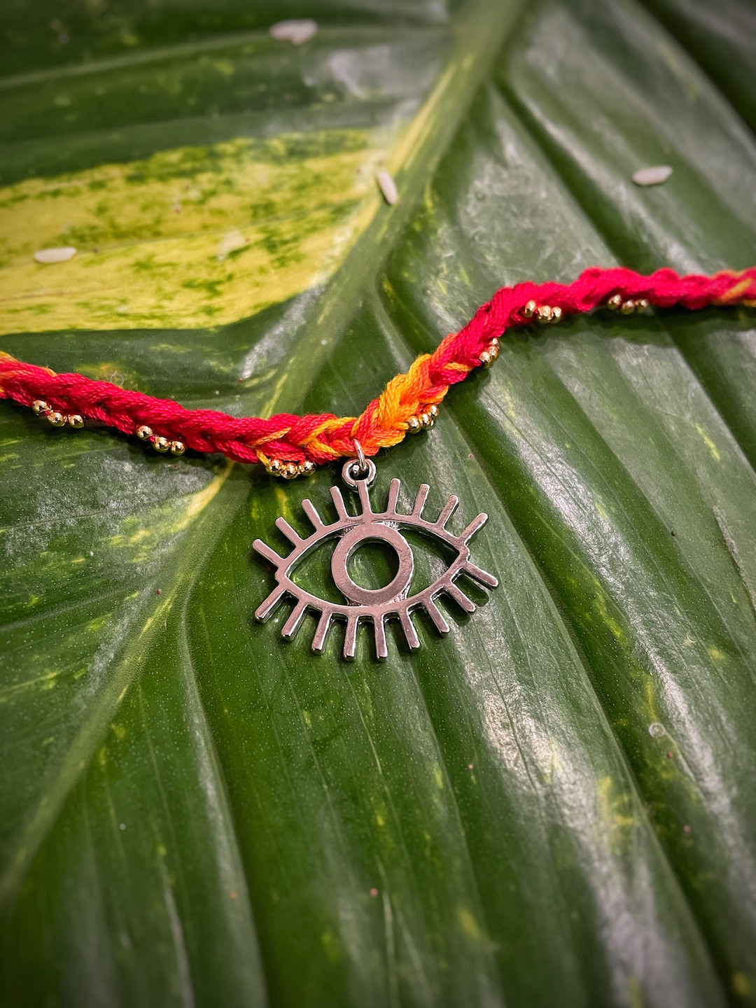 Digital Dress Room Red & Silver-Toned Pendant Evil Eye Rakhi