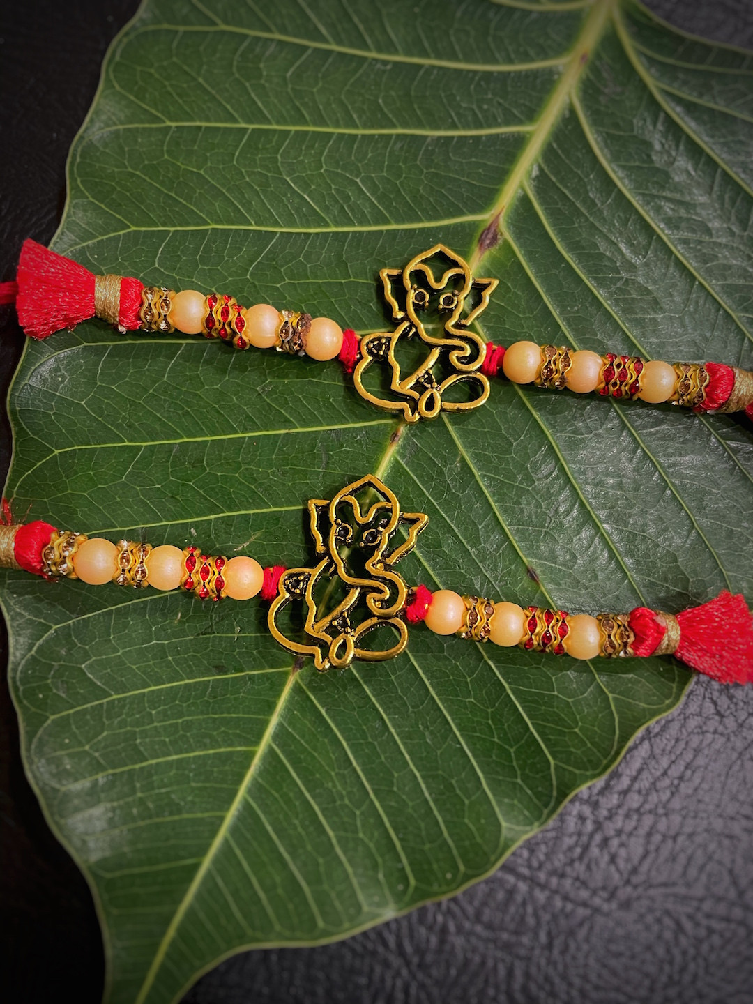 Digital Dress Room Red & Cream Set of 2 Ganesh Pendant Mauli Rakhi