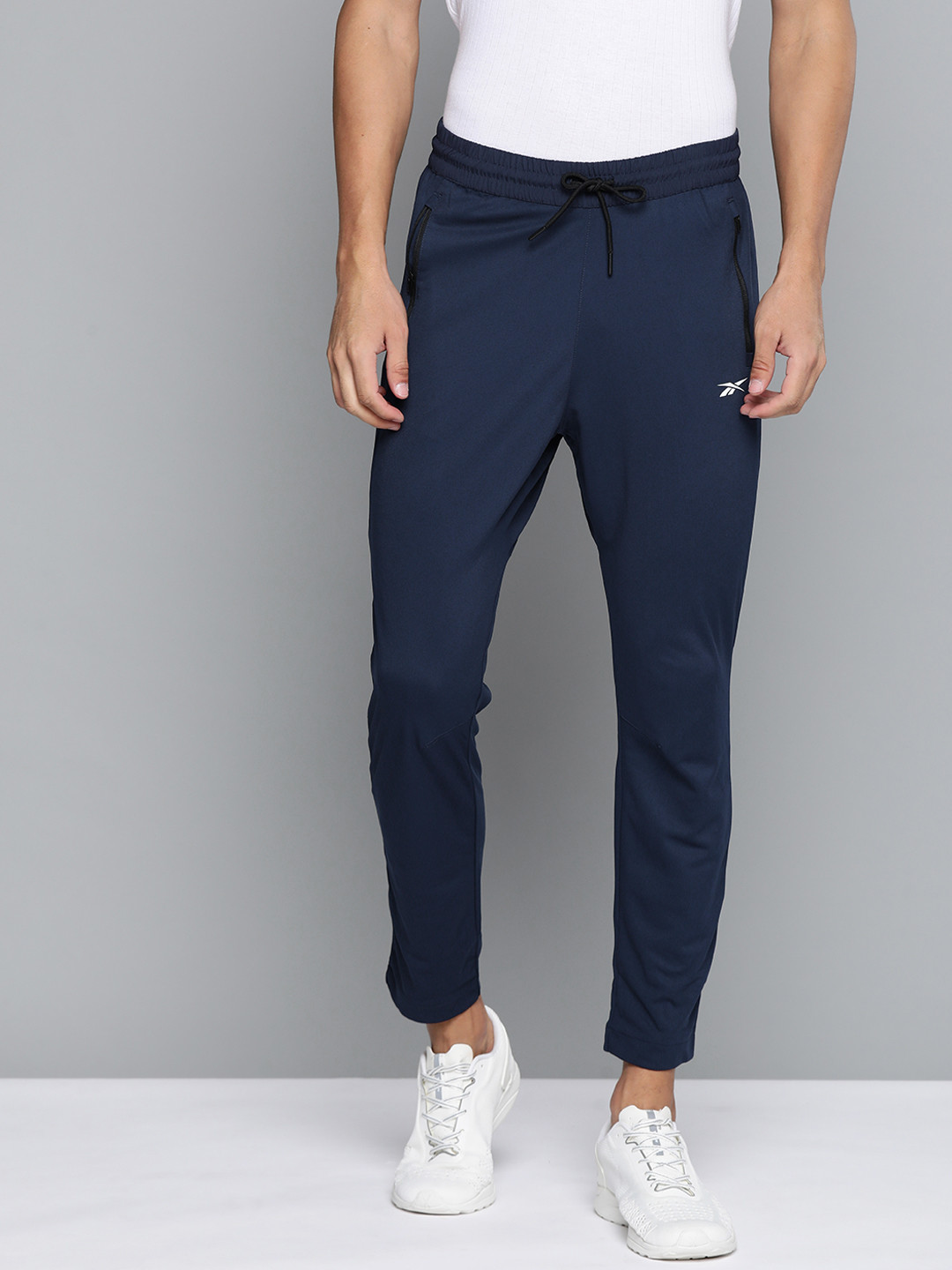 Reebok Men Navy Blue Solid Training WOR Knit Track Pants