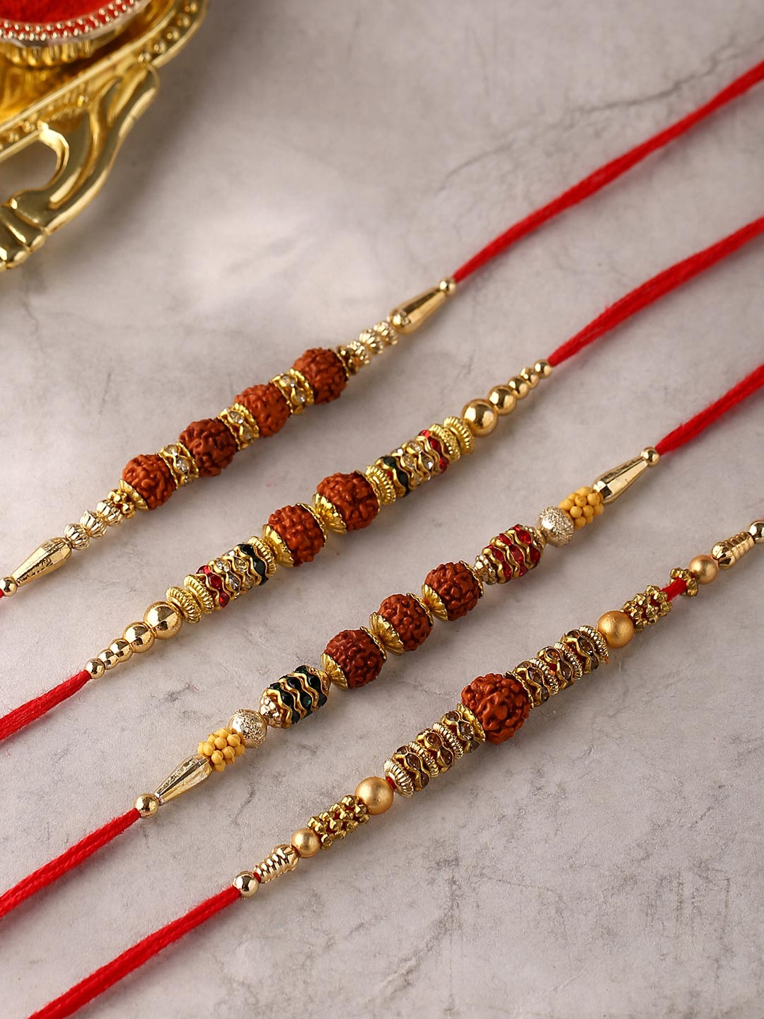 Voylla 4 Pcs Unisex Religious Rudraksha Rakhi Squad with Roli Chaawal Pack