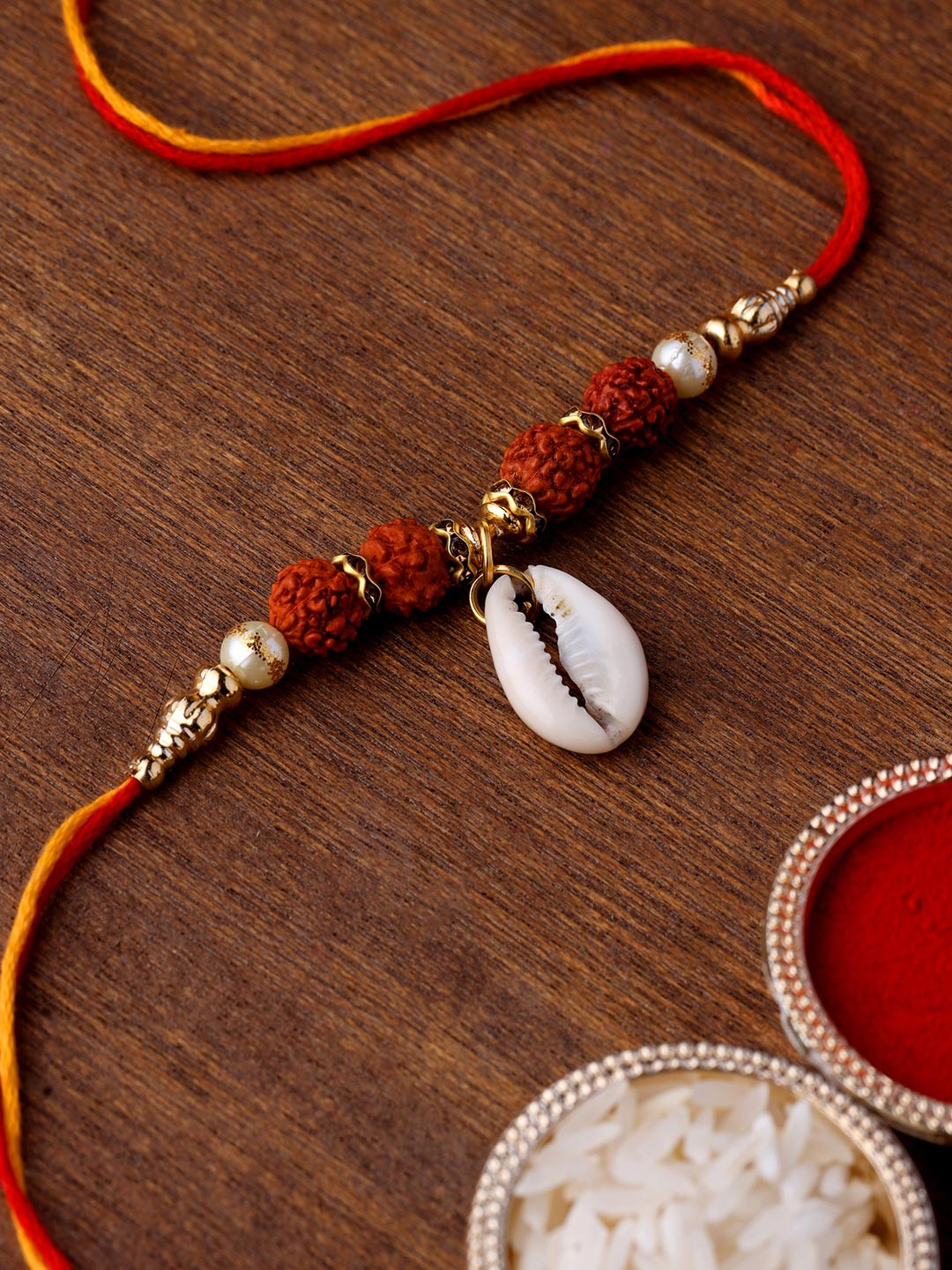 Voylla Divine Rudraksha Rakhi With Cowrie Shell