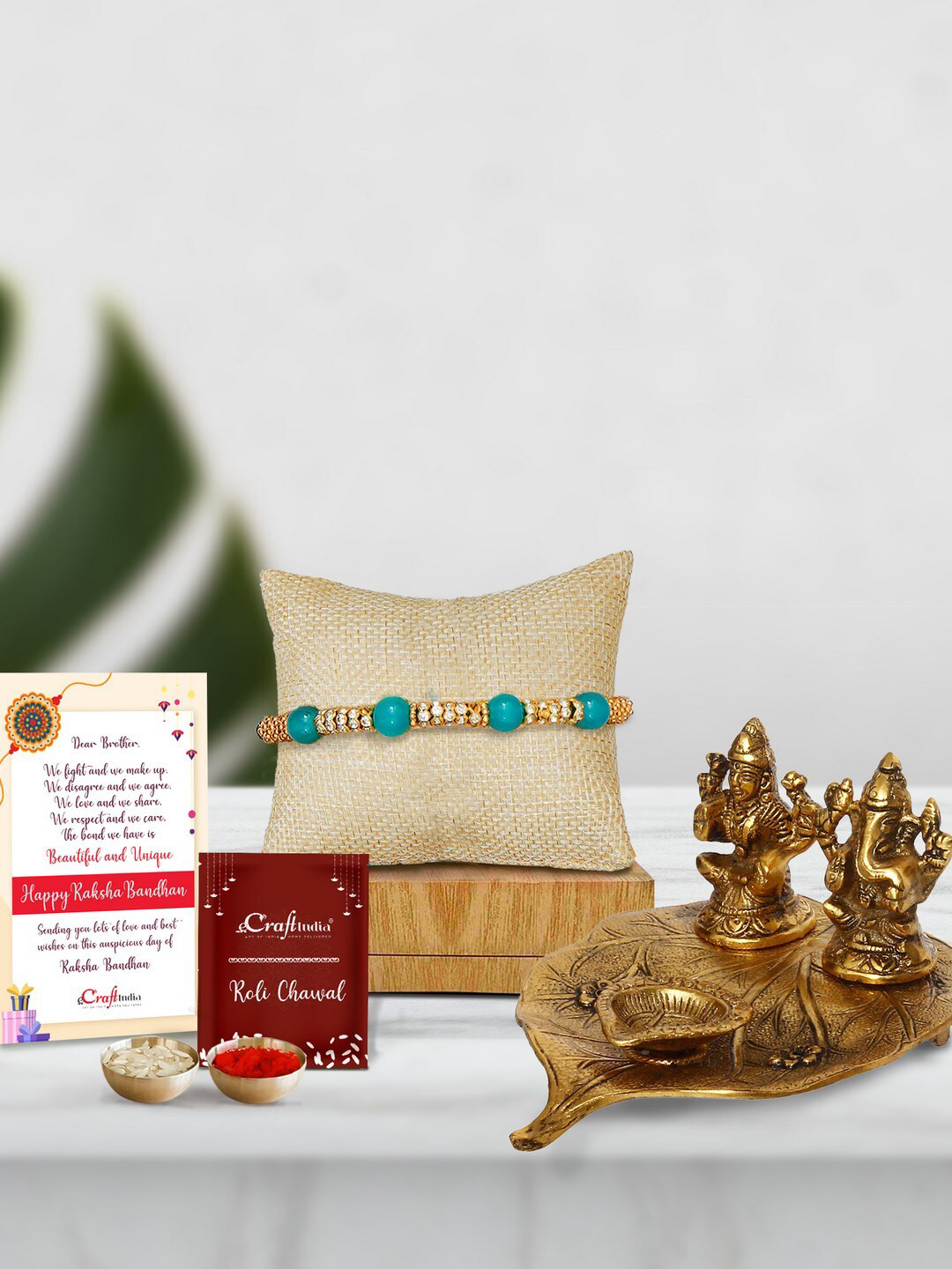 eCraftIndia Beads-Studded Rakhi With Lord Ganesha Idol Gift Set