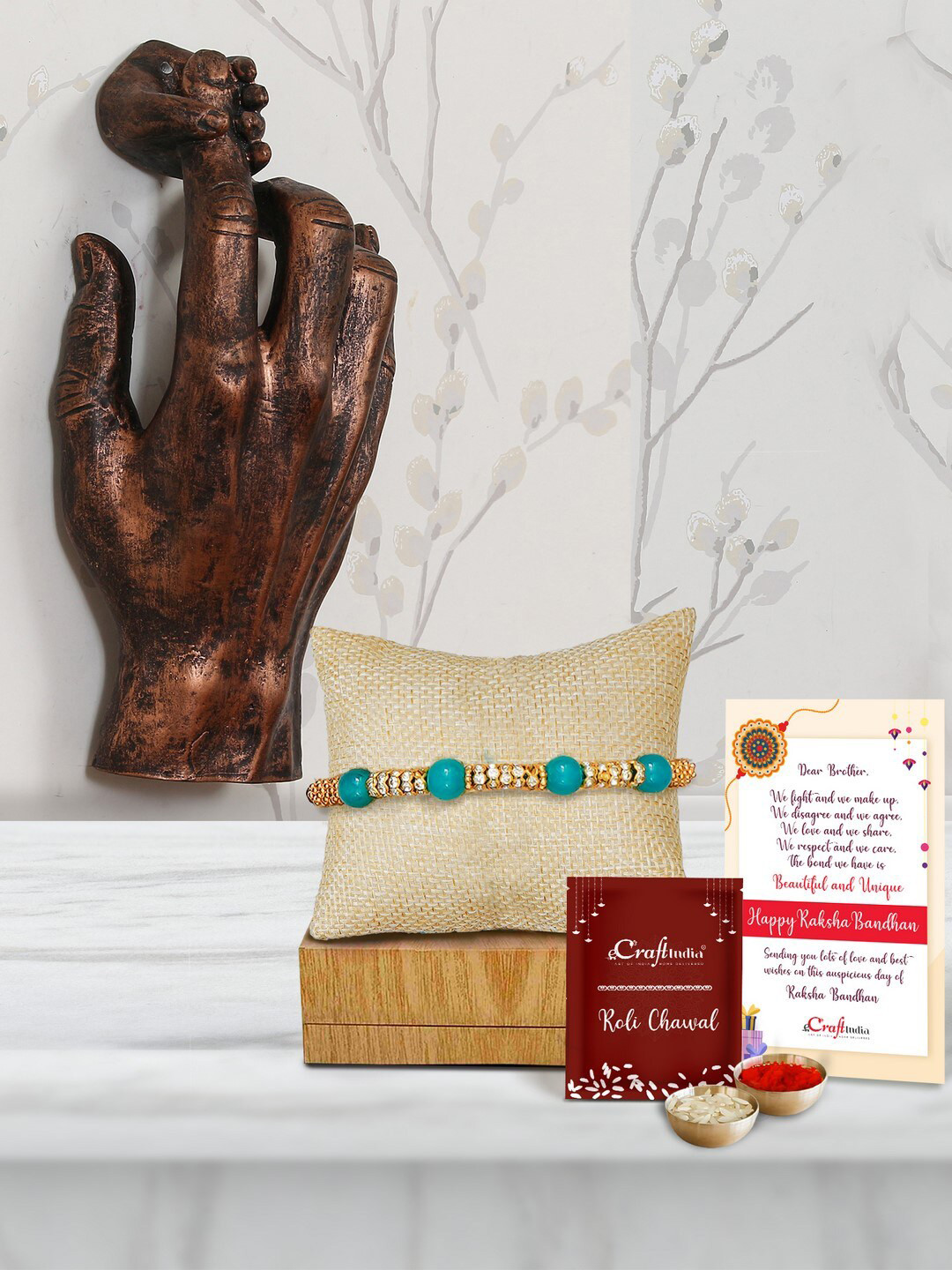 eCraftIndia Pearl Rakhi With Wall Hanging Figurine & Roli Chawal, Card
