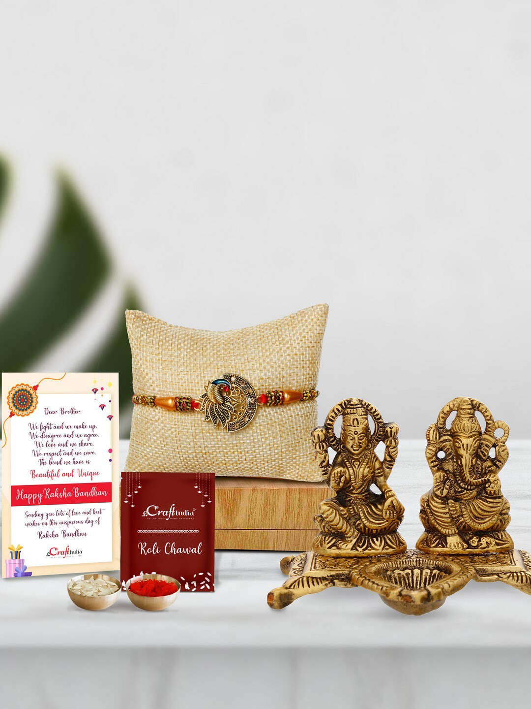 eCraftIndia Unisex Rakhi Gift Set With Laxmi Ganesha Metal Showpiece & Roli Chawal, Card