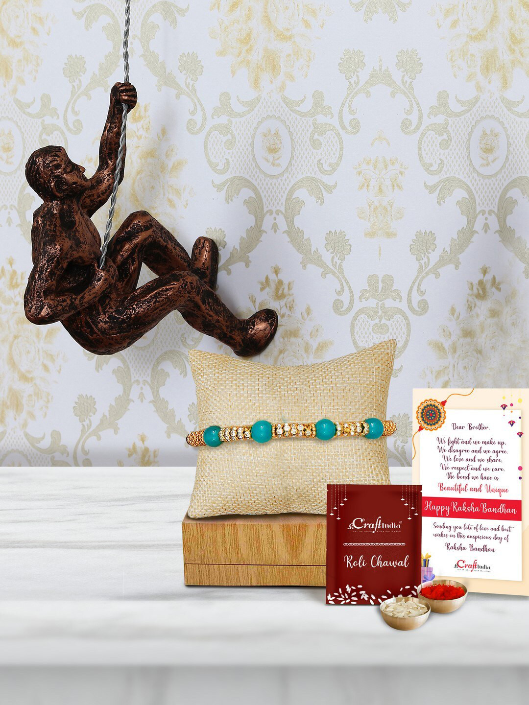 eCraftIndia Turquoise Blue & Gold-Toned Wall Hanging Statue Pearl Beaded Rakhi Gift Set