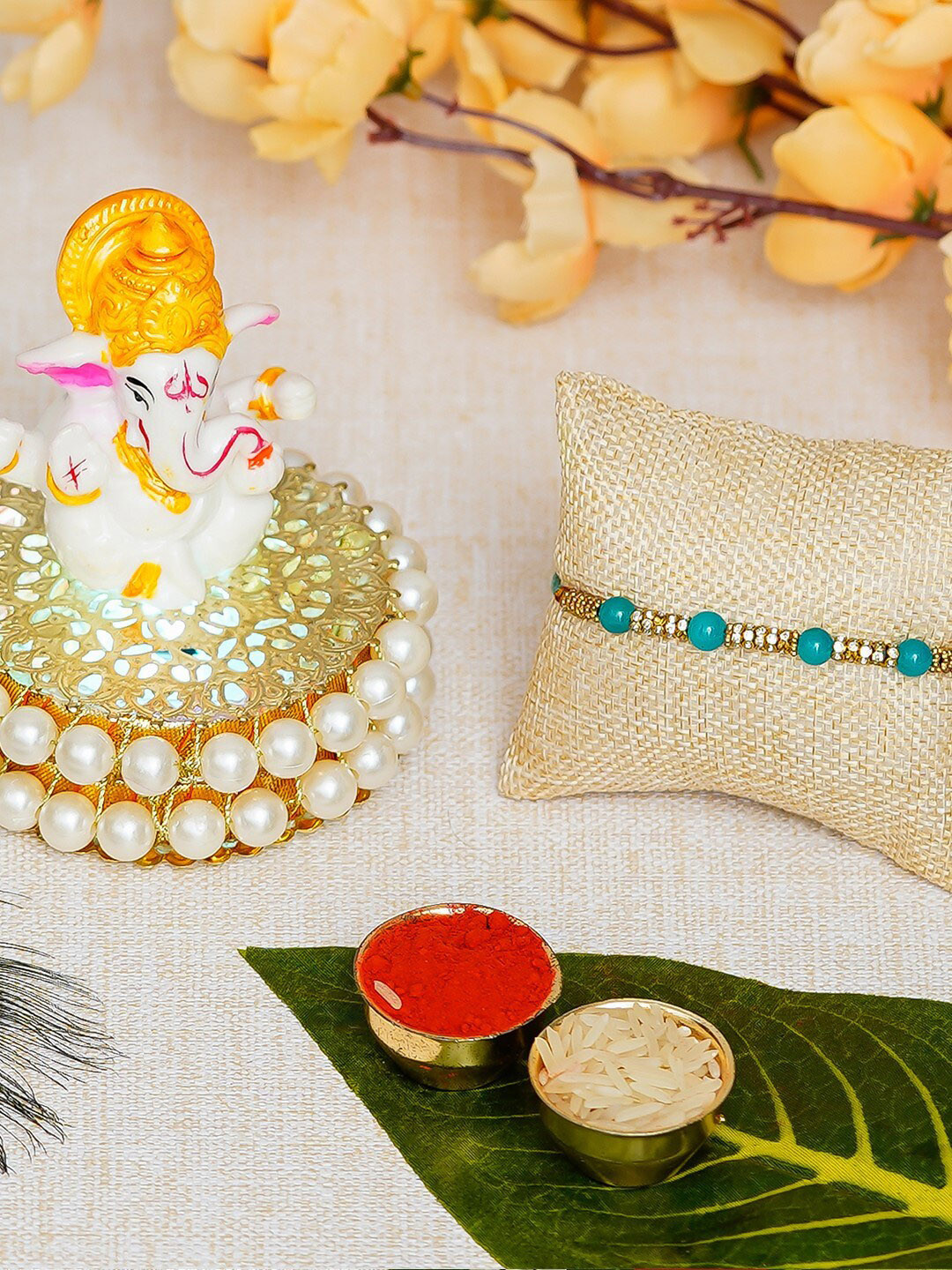 eCraftIndia Blue & White Beaded & Studded Ganesh Idol Rakhi Gift Set