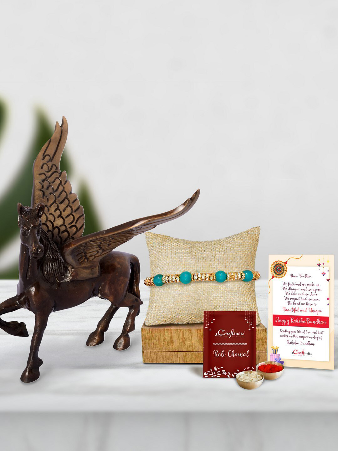 eCraftIndia Turquoise Blue & Gold-Toned Flying Angel Horse Rakhi Gift Set