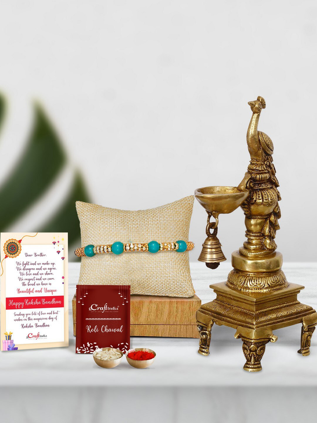 eCraftIndia Turquoise Blue & White Pearl Decorative Hanging Diya Rakhi Gift Set