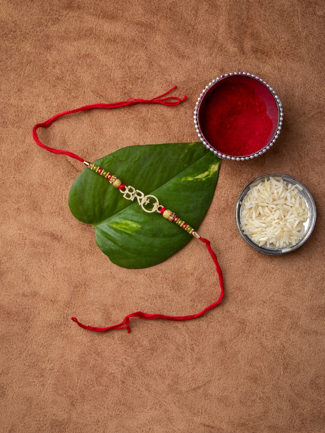 MORKANTH JEWELLERY Gold-Toned & Red Brass Handcrafted Rakhi