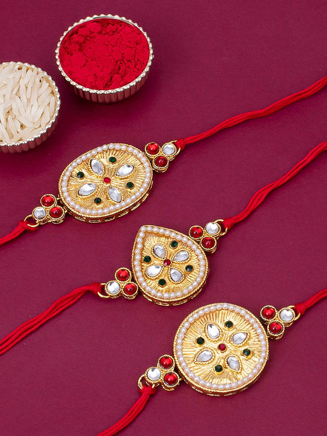 Sukkhi Rakhi Men Set Of 3 Gold-Plated White & Red Stone-Studded With Roli Chawal & Greeting Card