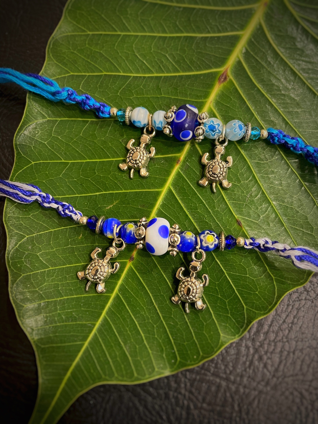 Digital Dress Room Men Set Of 2 Blue & Gold-Toned Evil Eye & Tortoise Design Rakhi