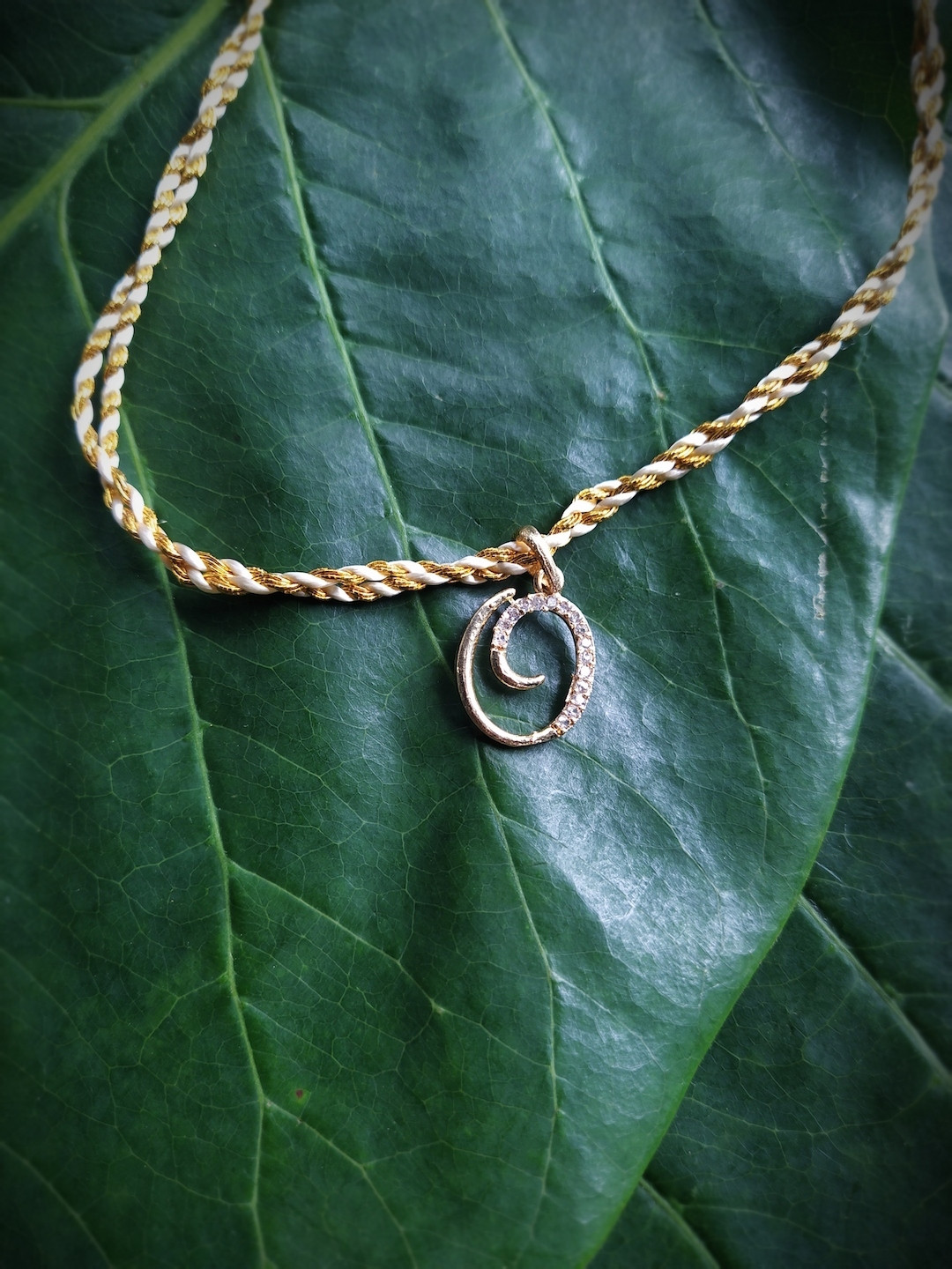 Digital Dress Room Men Gold-Plated White AD-Studded Letter O Personalised Rakhi