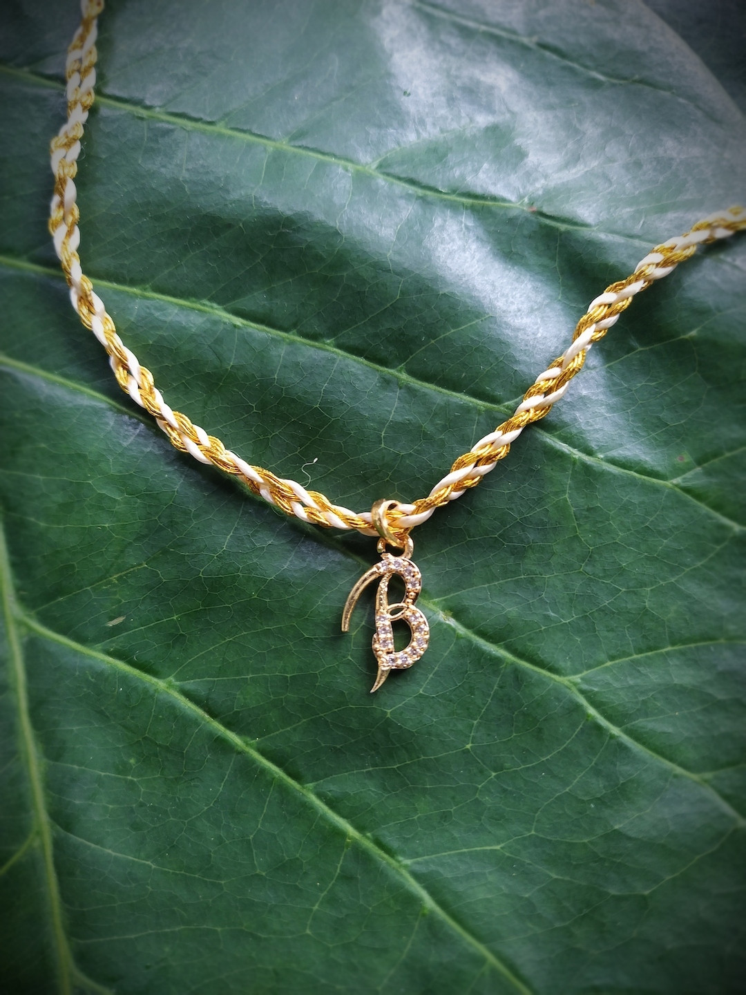 Digital Dress Room Men Gold-Plated & Cream-Coloured AD-Studded Alphabet B Rakhi