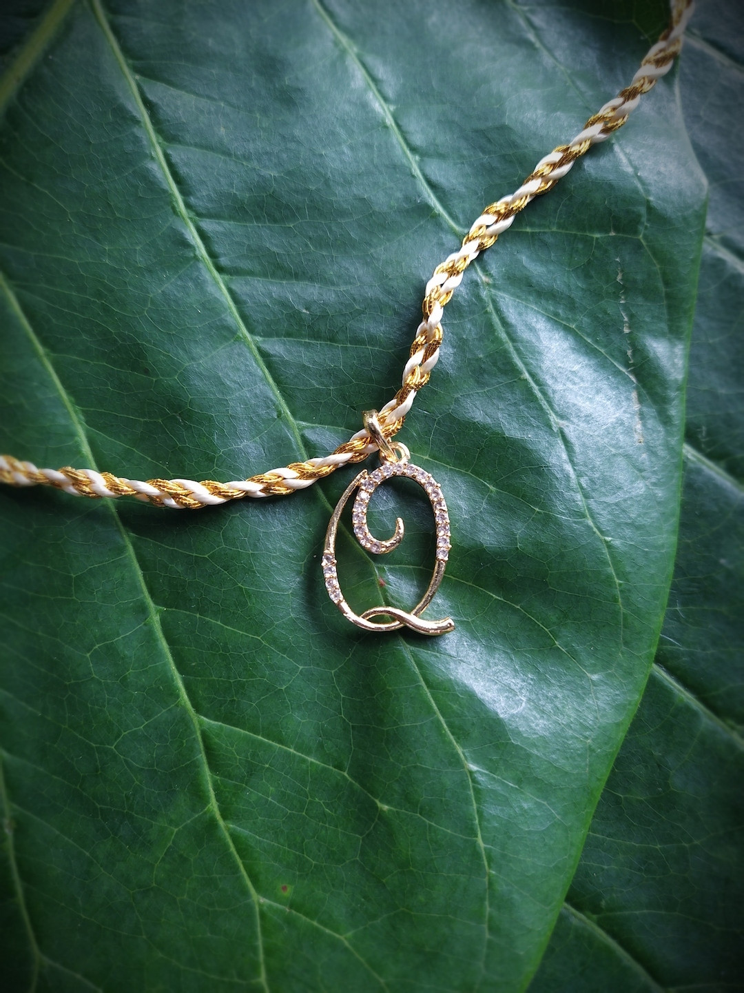 Digital Dress Room Men Gold-Plated & Cream-Coloured AD-Studded Alphabet Q Rakhi