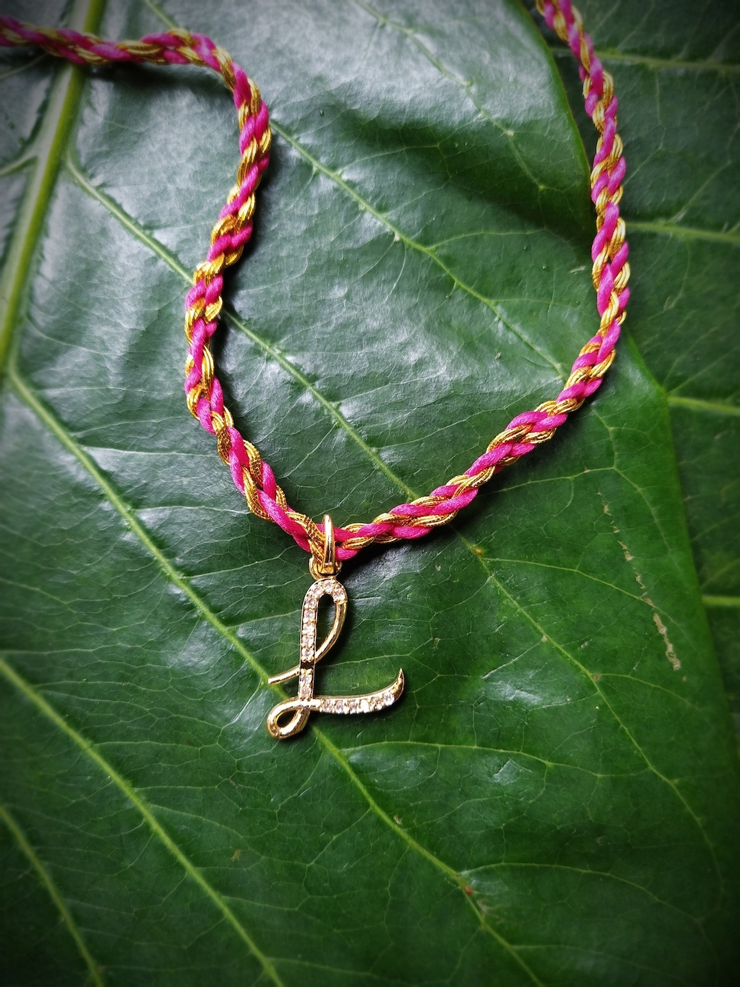 Digital Dress Room Men Gold-Plated White & Pink AD-Studded L Alphabet Customized Rakhi