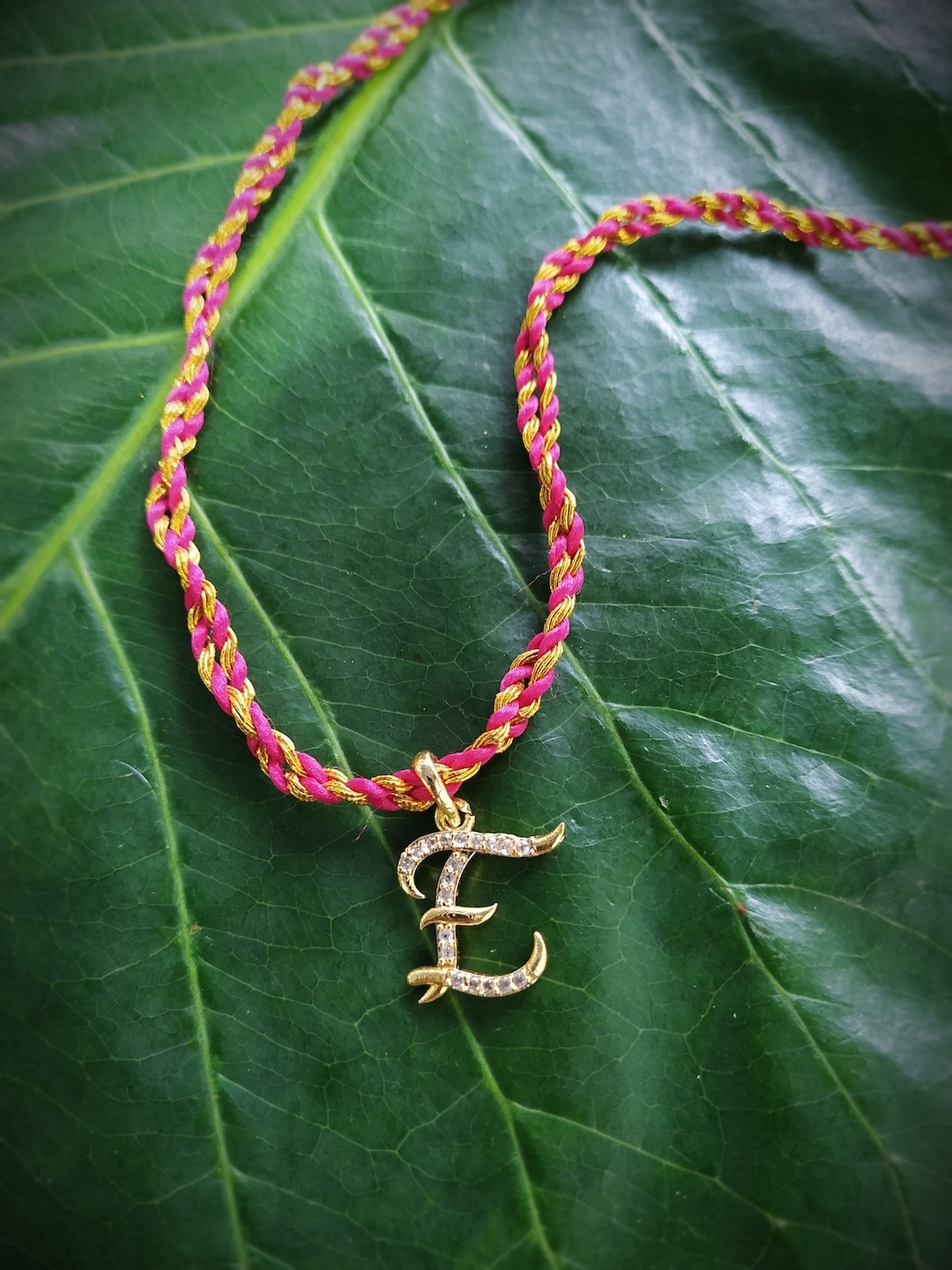 Digital Dress Room Men Gold-Toned & Red AD-Studded Letter E Customized Thread Rakhi