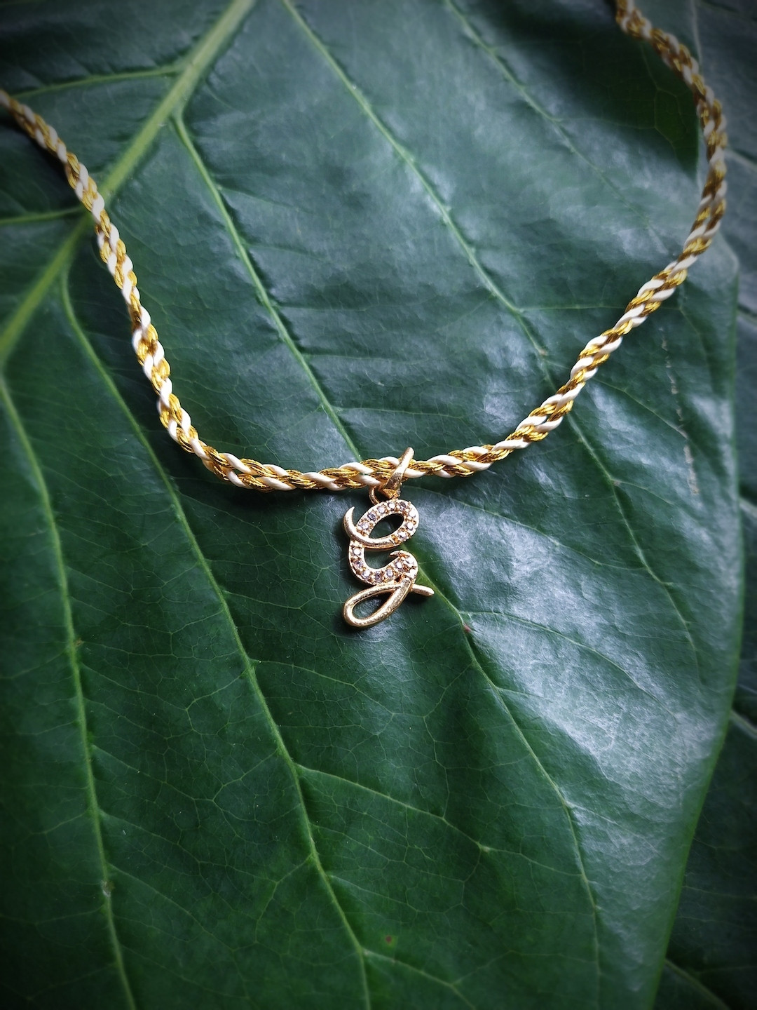 Digital Dress Room Men Gold-Plated & White AD-Studded Letter G Rakhi