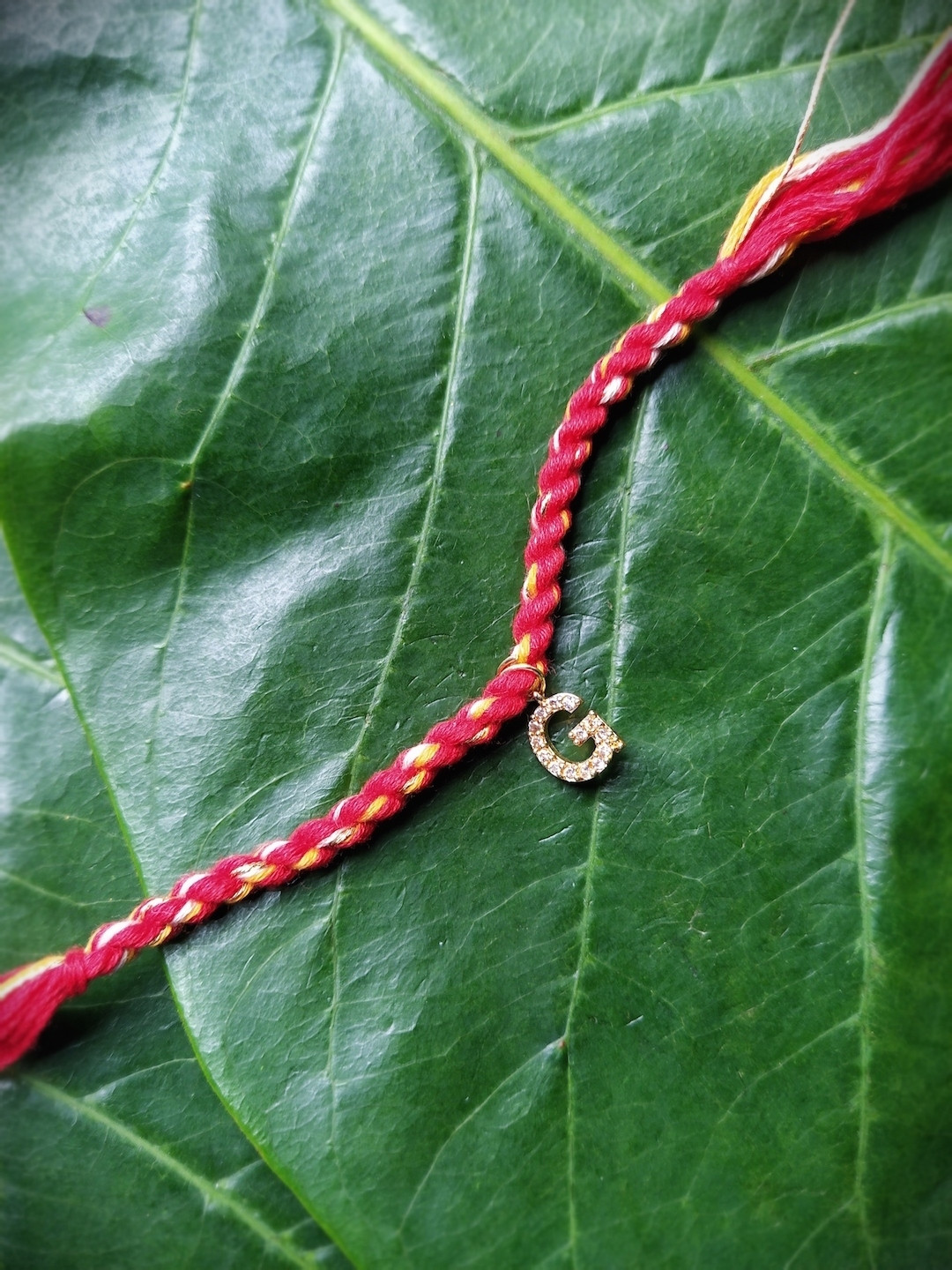 Digital Dress Room Unisex Gold-Plated Red AD-Studded G Alphabet Customized Thread Rakhi