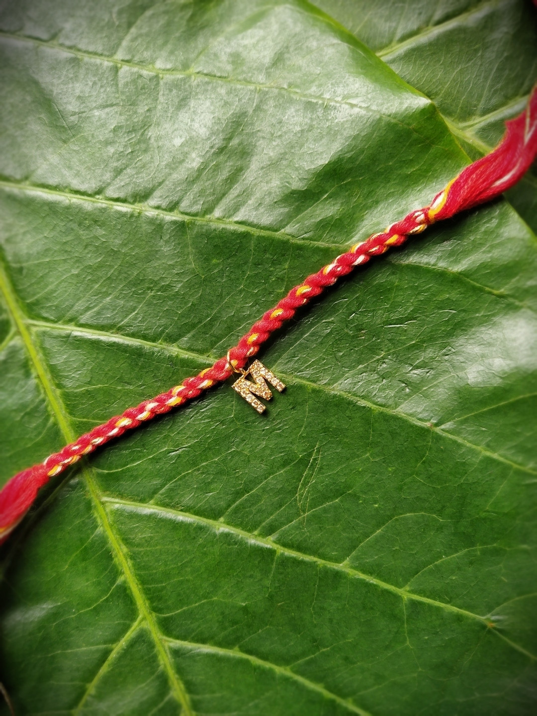 Digital Dress Room Men Gold-Plated Red & Yellow M Alphabet Customized Thread Rakhi