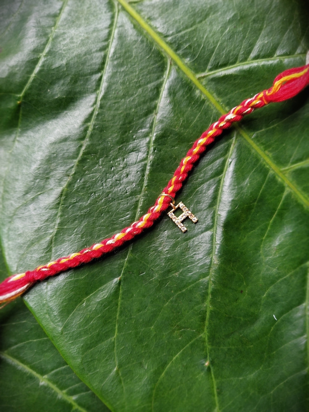 Digital Dress Room Unisex Gold-Plated Red AD-Studded H Alphabet Customized Thread Rakhi